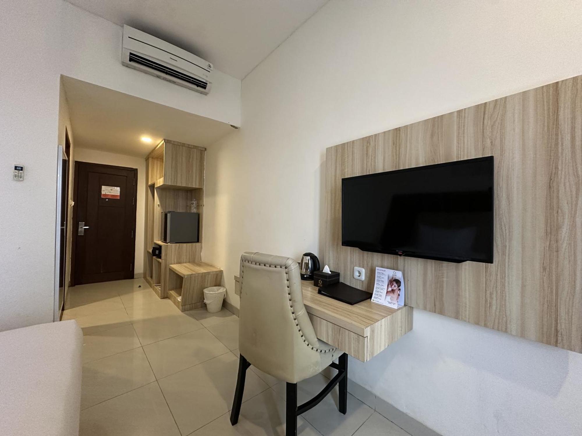Vega Prime Hotel & Convention Sorong Værelse billede