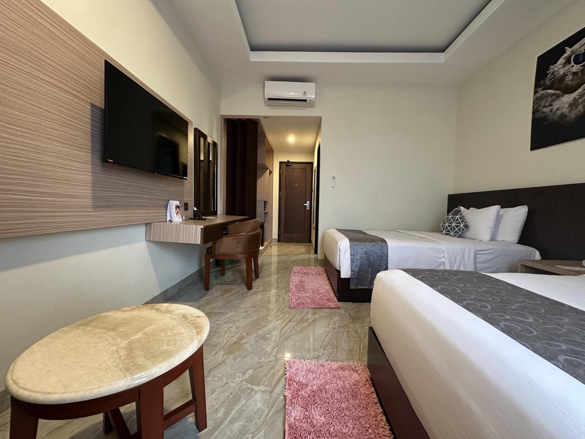 Vega Prime Hotel & Convention Sorong Værelse billede